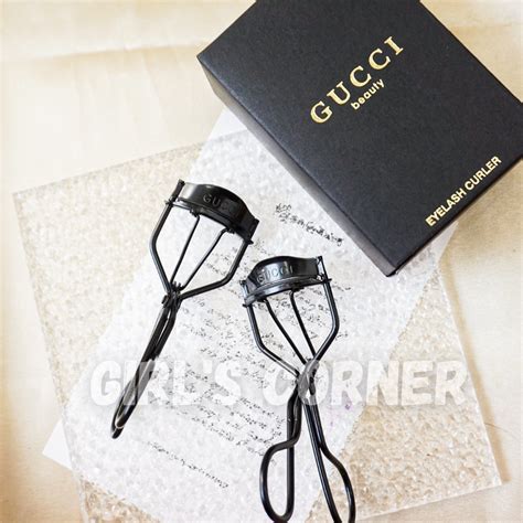 gucci eyelash curler